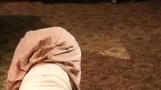 A Cute Little Dressed in a Jk Uniform Was Walking Around Barefoot on the Ground.