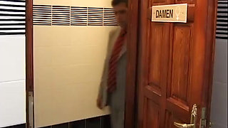 Gorgeous Brunette Gives A Blowjob in The Restroom