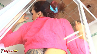 Fantastic brunette in pantyhose loves pissing in the shower