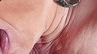 Horny Granny Fingers Wet Pussy to Shaking Orgasm