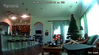 Camera catches MILF playing with pussy on couch