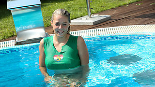 Small titted blonde spreads and fingers pussy poolside