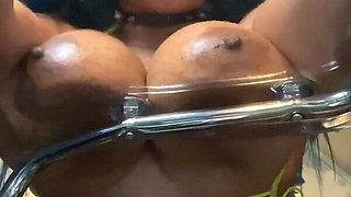 Busty Ebony Girl Rubbing Oiled Tits on a Clear Chair & Riding Her Dildo