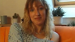 Lovely blonde with pierced tits rubs her pussy at the casting