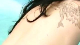 Hot Brunette Fingers Herself Passionately in the Hot Tub