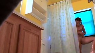 Stepdaughter 21 shaves pussy in shower (voyeur)