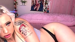 Hot blonde is smoking and masturbating on her webcam
