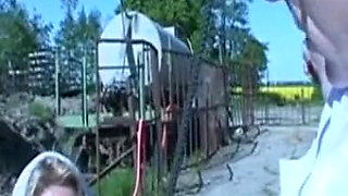 Sexy slave humiliating, chaining kneeling in the farm