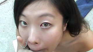 Asian Hottie Leandra Lee Sucks Cock POV Style by the Pool