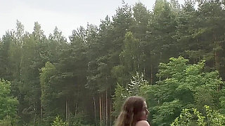 Teen Shows Tits and Asshole During a Storm in the Forest