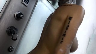 Blonde Babe Pleasures Herself with a Dildo in the Shower