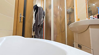 A Busty BBW Showering in the Shower Cabin, Shaving Her Armpits, Pussy, and Legs.