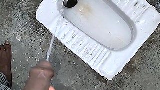 Desi Bhabhi Holding Stepbrother-in-law's Penis and Making Him Pee and Peeing Herself