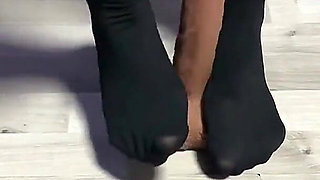 Sexy Dominatrix in Nylon Pantyhose Is Trampling Your Cock