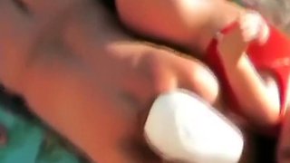 Spooning position on the beach (aunt and lover)