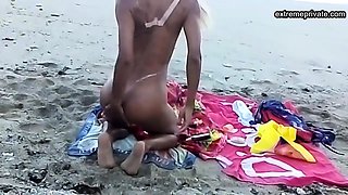 My stepdaughter teases me on the beach