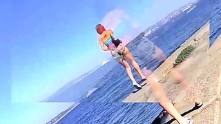 A tattooed redhead mother and a fellow enjoy an