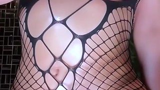 Fishnet clad beauty reaches explosive squirt in close up bliss