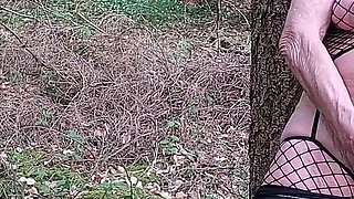 Granny Is Masturbating in the Woods!