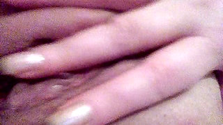 A 50-year-old woman with a beautiful pussy masturbates.