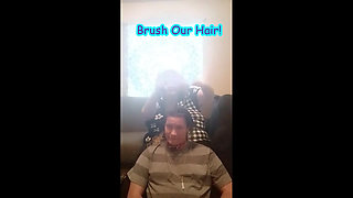 Brushing Our Hair Taking Turns