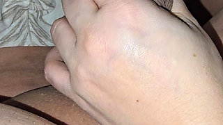 Step mom stick her hand on step son dick in erection and handjob his dick