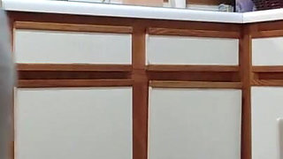 Buttcrack reveal unloading dishwasher