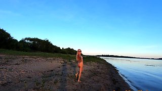 Russian Nudist on the River Shore