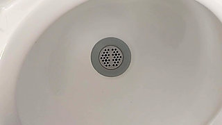 Moaning daddy has a lot of pressure and milks his cock in the public toilet