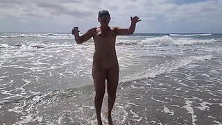 Playing at the nude beach.