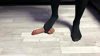 Sexy Dominatrix in Nylon Pantyhose Is Trampling Your Cock