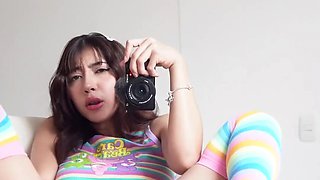 Hot teen girl lays back with spread legs and plays with herself