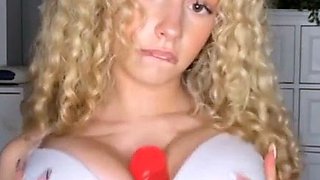 Kira Pregiato Busty Blonde Places Dildo Between Tits And