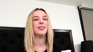 Webcam blonde plays with a toy