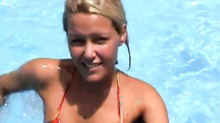 Sophie Moone shows off her nice bikini body by the poolside