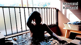 A Married Woman Taking a Bath in a Hotel Room