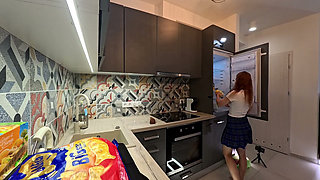 The Juggler Girl Is Here in a Long College Type Uniform Skirt to Flash Her Panties Under Her Miniskirt in the Kitchen
