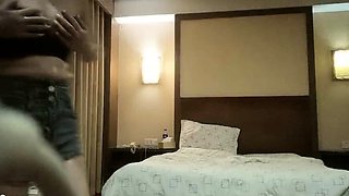 Cute amateur asian web cam girl playing with her toy