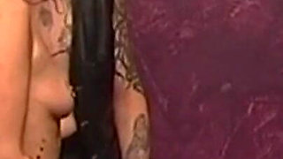 Tattooed Blonde MILF Endures Dungeon Spanking Session