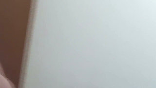 Busty Redhead in Glasses Films Herself Naked in the Bathroom Mirror