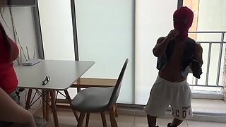 A beautiful brunette was fucked in the pussy by a robber in the kitchen