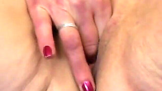 Horny Old Granny Fingers Her Mature Pussy on the Couch