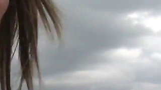 German brunette milf penetrates her pussy with a huge dildo as well as having the help of the wathcer who film her in