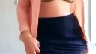 Turkish Arab in Hijab and Turban Performs a Striptease