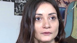 Amateur black-haired masturbates with a toy