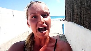 Outdoor solo masturbation scene with curly blonde